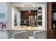 Kitchen counter with white granite and views into dining and kitchen area at 121 Holly Ave, Sarasota, FL 34243