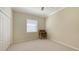 Spacious bedroom with carpeted floor and a vintage desk at 12471 Natureview Cir, Bradenton, FL 34212