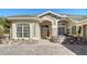 One story home with stone accents and a welcoming front entrance at 12471 Natureview Cir, Bradenton, FL 34212