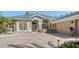 House exterior showcasing a paver driveway and two-car garage at 12471 Natureview Cir, Bradenton, FL 34212