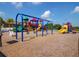 Colorful playground with swings, slides, and play structures for  at 12471 Natureview Cir, Bradenton, FL 34212