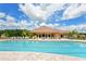 Resort-style pool with clubhouse and lounge chairs at 12471 Natureview Cir, Bradenton, FL 34212