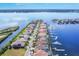 Community aerial view showing waterfront homes and canal at 129 12Th E Ave, Palmetto, FL 34221