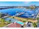 Aerial view of marina, tennis court, and pool at 129 12Th E Ave, Palmetto, FL 34221