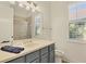 Clean bathroom with walk-in shower and updated vanity at 129 12Th E Ave, Palmetto, FL 34221