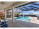 Relaxing screened pool and patio with water view at 129 12Th E Ave, Palmetto, FL 34221