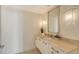 Well-lit bathroom features marble counters, and modern lighting at 1350 Main St # 1410, Sarasota, FL 34236