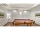 Game room with a billiards table, hardwood floors, and decorative wall sconces at 1350 Main St # 1410, Sarasota, FL 34236