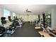 Well-equipped gym with modern exercise machines and mirrored walls at 1350 Main St # 1410, Sarasota, FL 34236