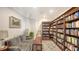 Cozy library with floor-to-ceiling bookshelves and comfortable seating at 1350 Main St # 1410, Sarasota, FL 34236