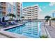 Enjoy the pool in this complex which is surrounded by beautiful palms and lounge chairs at 1350 Main St # 1410, Sarasota, FL 34236