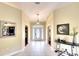 Bright and spacious entryway with tile flooring and a view into the living areas at 13609 2Nd Ne Ave, Bradenton, FL 34212