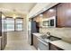 Well-equipped kitchen featuring stainless steel appliances and granite countertops at 13609 2Nd Ne Ave, Bradenton, FL 34212