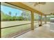 Relaxing screened porch overlooking a large backyard at 13609 2Nd Ne Ave, Bradenton, FL 34212