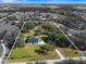 Aerial view showing home's location on large lot at 13995 Mossy Hammock Ln, Myakka City, FL 34251