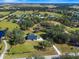 Aerial view of house and expansive lot at 13995 Mossy Hammock Ln, Myakka City, FL 34251