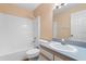 Bathroom with shower/tub combo and single sink vanity at 13995 Mossy Hammock Ln, Myakka City, FL 34251