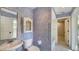 Small bathroom with pedestal sink and shower/tub combo at 1423 Kimlira Ln, Sarasota, FL 34231