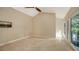 Spacious bedroom with hardwood floors and large windows at 1423 Kimlira Ln, Sarasota, FL 34231