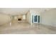 Bright and airy living room with marble floors at 1423 Kimlira Ln, Sarasota, FL 34231