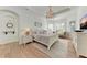 Bright bedroom with hardwood floors and a neutral color palette at 149 Montelluna Dr, North Venice, FL 34275