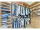 Large walk-in closet with ample shelving and hanging space at 149 Montelluna Dr, North Venice, FL 34275