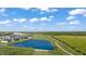 Wide aerial view of community and golf course at 17505 Opal Sand Dr # 108, Venice, FL 34293