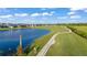 Aerial view of homes adjacent to a golf course at 17505 Opal Sand Dr # 108, Venice, FL 34293