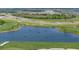 Aerial view of golf course and surrounding area at 17505 Opal Sand Dr # 108, Venice, FL 34293