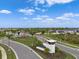 Aerial view of community entrance and landscaping at 17505 Opal Sand Dr # 108, Venice, FL 34293