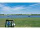 Golf course with a lake view and driving range at 17505 Opal Sand Dr # 108, Venice, FL 34293