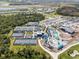 Aerial view of resort amenities including tennis and pickleball courts at 17505 Opal Sand Dr # 108, Venice, FL 34293