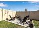 Backyard patio with fire pit and seating area at 17741 Canopy Pl, Bradenton, FL 34211