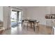 Bright dining area with sliding glass doors leading to the backyard at 17741 Canopy Pl, Bradenton, FL 34211