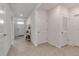 Simple entryway with tile flooring and access to other rooms at 17741 Canopy Pl, Bradenton, FL 34211