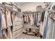 Well-organized walk-in closet with shelves and hanging rods at 17741 Canopy Pl, Bradenton, FL 34211