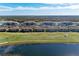 Aerial view of community with multiple buildings and golf course at 18017 Gawthrop Dr # 101, Bradenton, FL 34211