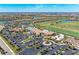 Expansive community view showcasing clubhouse and amenities at 18017 Gawthrop Dr # 101, Bradenton, FL 34211