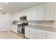 Modern kitchen with stainless steel appliances and granite countertops at 18017 Gawthrop Dr # 101, Bradenton, FL 34211