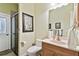 Well-appointed bathroom with shower, toilet and vanity at 1854 Amberwynd W Cir, Palmetto, FL 34221