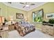 Spacious bedroom with a queen-size bed and a view at 1854 Amberwynd W Cir, Palmetto, FL 34221