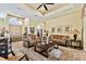 Elegant living room with neutral color palette and ample natural light at 1854 Amberwynd W Cir, Palmetto, FL 34221