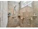 Large walk-in shower with grab bars and tile at 1854 Amberwynd W Cir, Palmetto, FL 34221