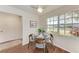 Cozy dining area with a round table and four chairs near a large window at 20032 Sancraft Ave, Port Charlotte, FL 33954