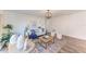 Spacious living room with hardwood floors, comfy sofa, and stylish decor at 20032 Sancraft Ave, Port Charlotte, FL 33954