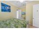 Bedroom with a queen bed and TV at 203 69Th St # A, Bradenton Beach, FL 34217