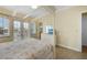 Bedroom with a four-poster bed and access to balcony at 203 69Th St # A, Bradenton Beach, FL 34217