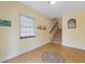 Bright entryway with tiled floor and staircase at 203 69Th St # A, Bradenton Beach, FL 34217