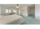 King sized bed in well lit bedroom with large closet at 2119 Zipperer Rd, Bradenton, FL 34212