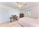 Bedroom with double bed, wooden desk and chair at 2119 Zipperer Rd, Bradenton, FL 34212